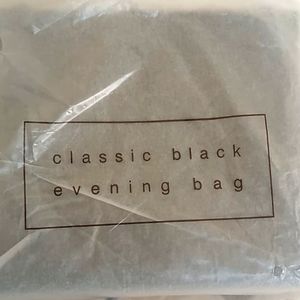 Avon Products classic black evening bag